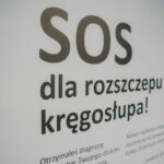 Banner programu SOS dla rozszczepu kręgosłupa.